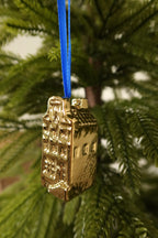 Side view of the square gable gold mini canal house ornament