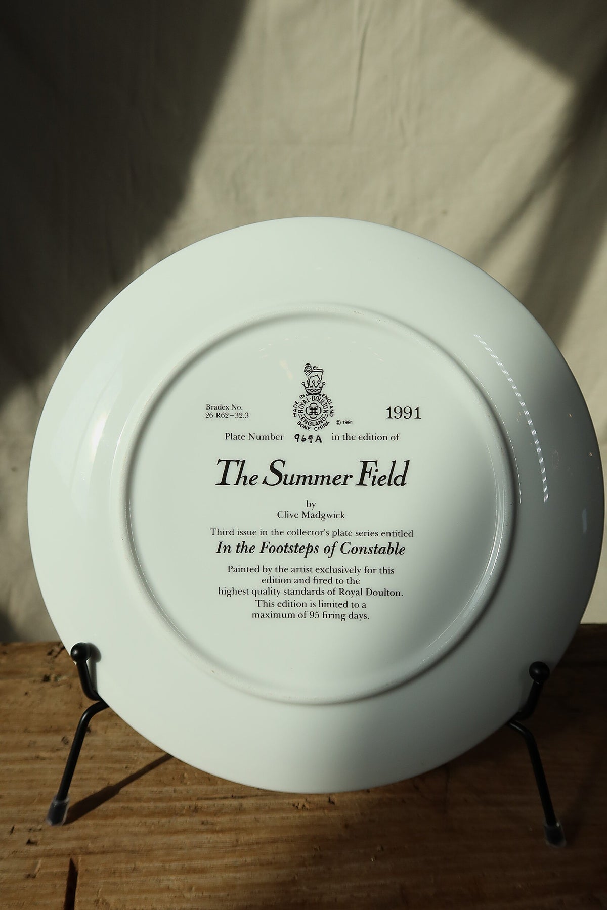 Back of the Royal Doulton The Summer Field plate showing the backstamp with title, artist and series details