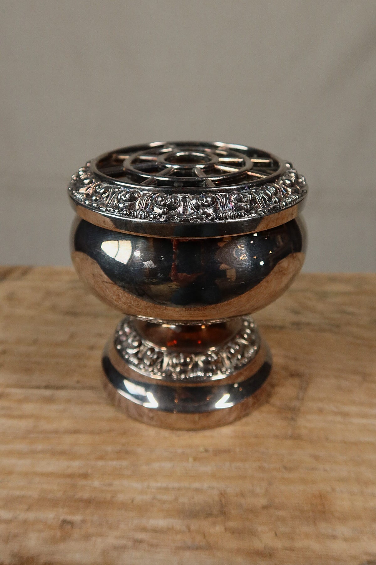 Vintage Ianthe of England silver plate footed rose bowl with a pierced flower frog grille and embossed floral borders